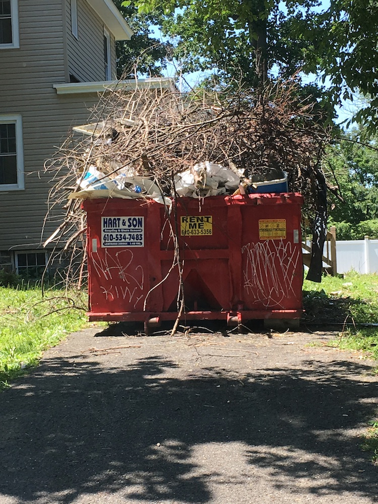Overloaded Dumpster
